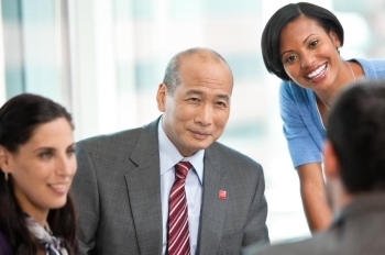 financial advisor team consulting with client